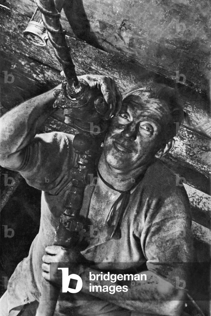 The shot hole driller looks like a modern Hercules in modern industry. 
15th May 1935