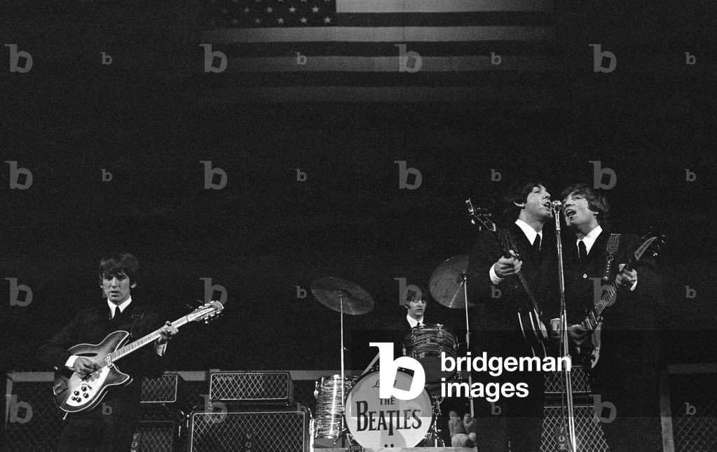 The Beatles onstage before the stars and stripes on the second night of their US tour at the Convention Centre, Las Vegas, Nevada. Left to right: George Harrison, Ringo Starr, Paul McCartney and John Lennon.
20th August 1964