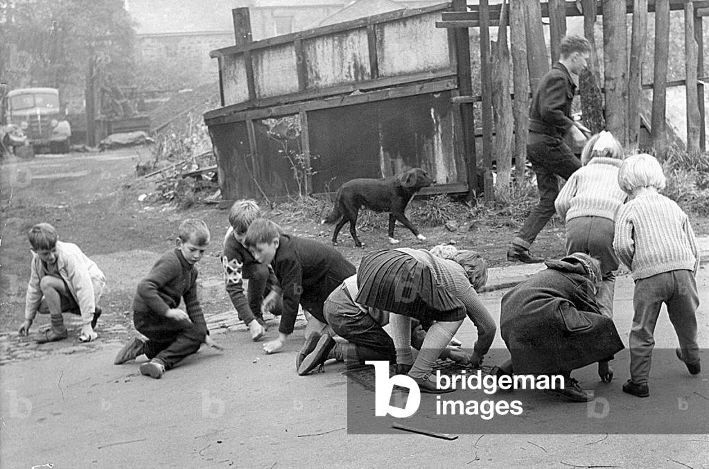 The 'Chuck Out' or 'Hoy Dot' on Tyneside and still an old tradition observed in the North East, 1972 (b/w photo)