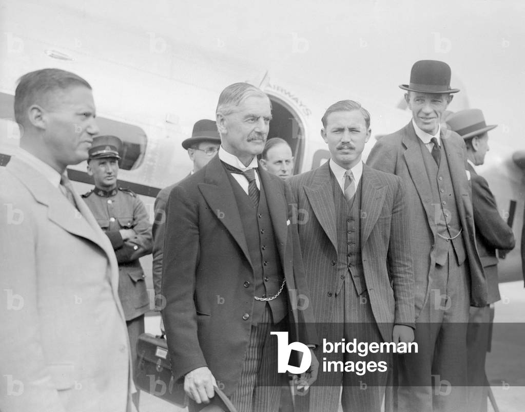 British Prime Minister Neville Chamberlain at Heston airport for a meeting with German Chancellor Adolf Hitler in Munich, 15th September 1938 (b/w photo)