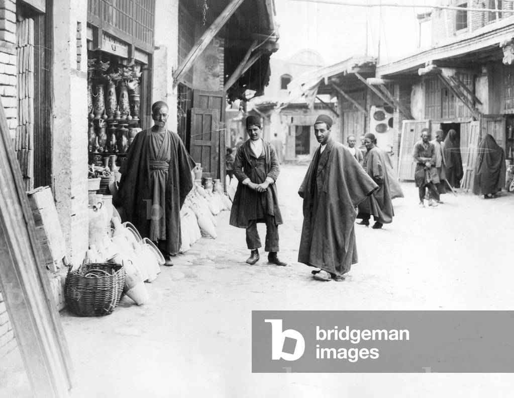 A potters shop in Hamadan, capital city of Hamadan Province of Iran, c. 1926 (b/w photo)