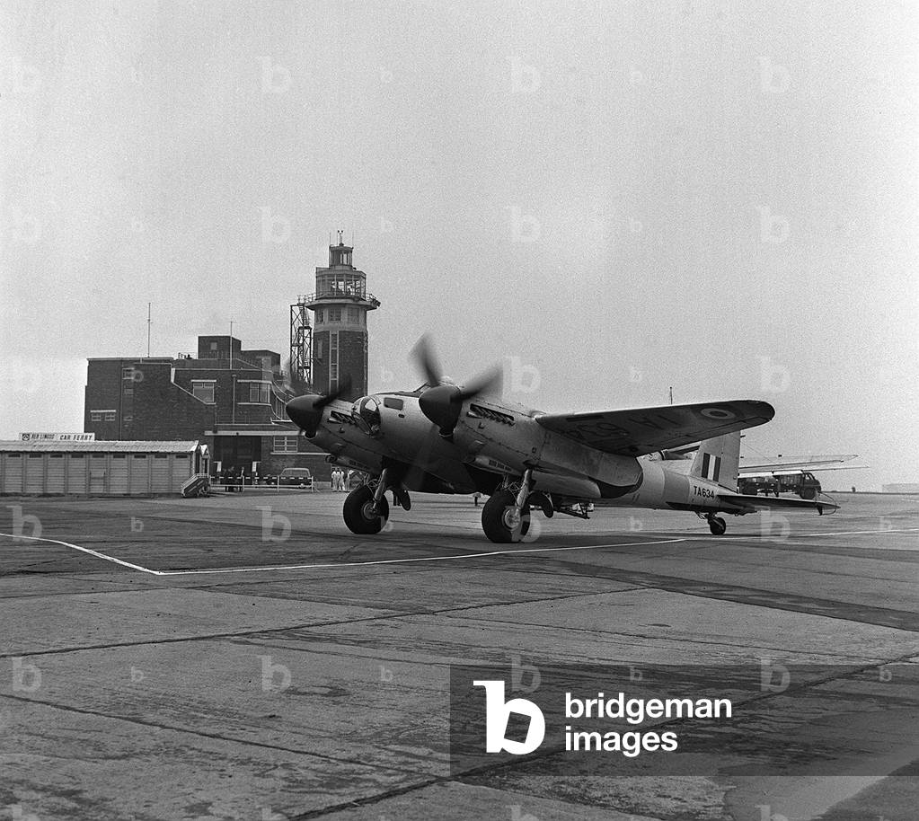 Aircraft De Havilland DH98 Mosquito TA634 arrives at Liverpool Airport flown by Flying Officer Kirkham, 1963 (b/w photo)