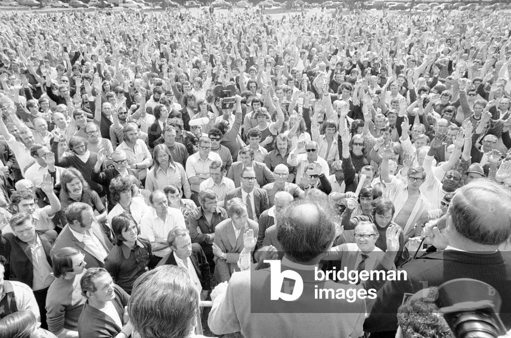 Mr Bill Lapworth, District Organiser of the Transport and General Workers Union, holds a mass meeting of Chrysler workers gathered at Coventry to put a resolution to them to return to work following the industrial dispute.
23rd June 1973