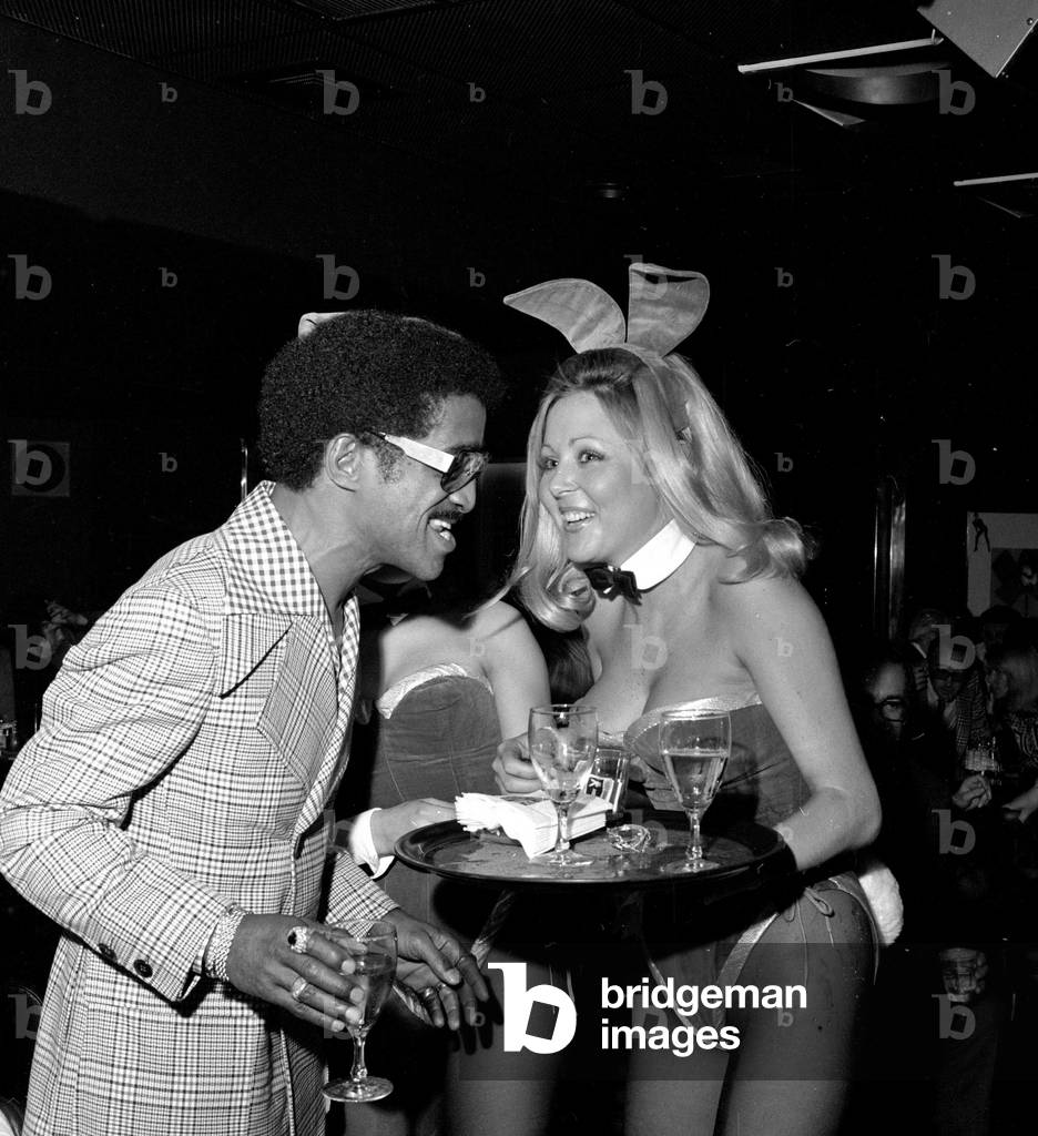 Sammy Davis party. Sammy Davis Jnr. talking to a Bunny Girl.
12th May 1973