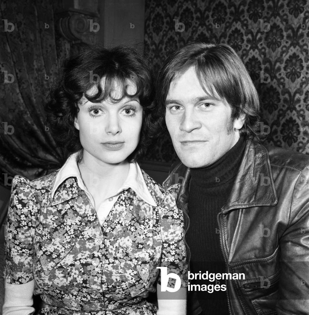 Actor Nicky Henson poses with actress Madeline Smith. 7th March 1975 (b/w photo)