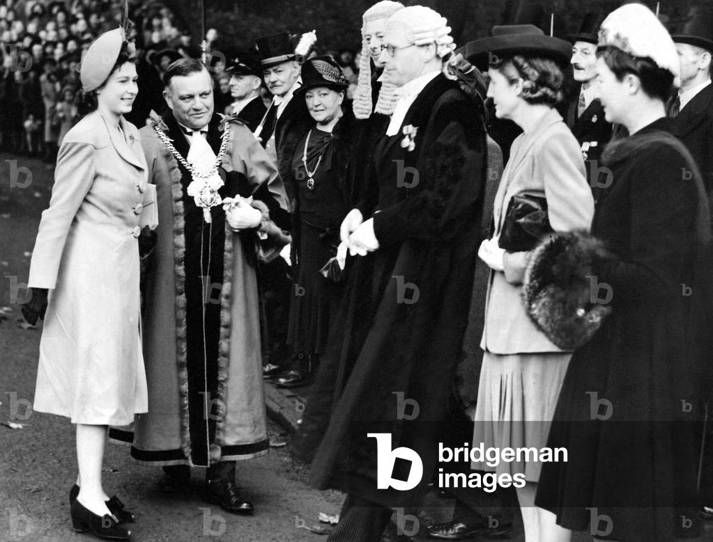 Queen Elizabeth II, Princess Elizabeth visits Durham, accompanied by the Mayor of Durham Coun H C Ferens, receiving officails and their wives after her arrival at Prebend's Bridge, 
23/10/1947