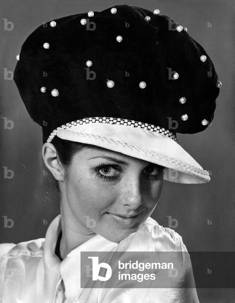 Reveille Fashion. Shirley Hounsell. Sunday best. Black and sophisti-cap is made in velvet. It is trimmed with pearl beads on the crown, and beads round the brim. December 1969