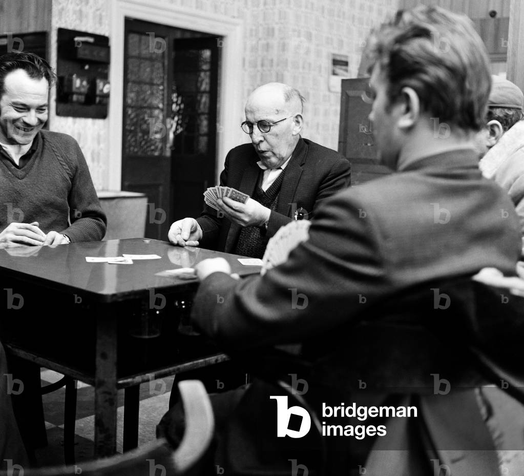 Buff's Working Mens Club, Middlesbrough, North Yorkshire. Men playing a game of cards. 17th March 1968 (b/w photo)