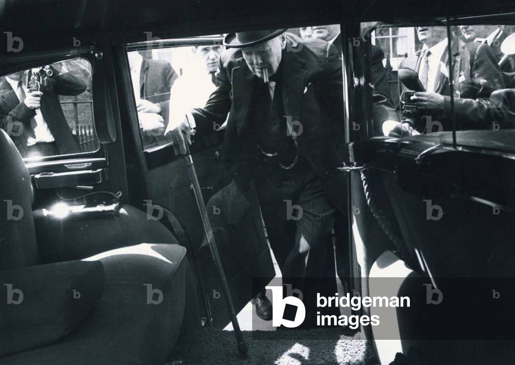 Winston Churchill former British Prime Minister July 1964
getting into the back of car. July 1964