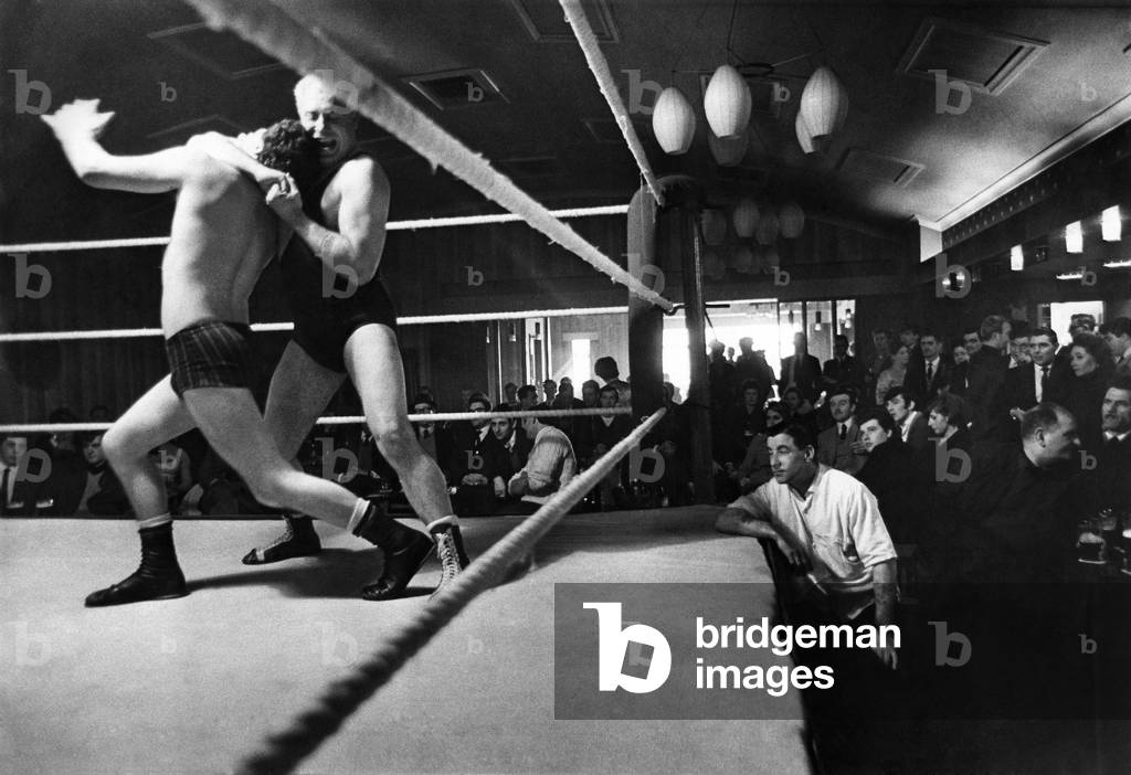 Customers in the Lumley Arms, Maltby, Yorks, watch lunchtime wrestling. February 1967
