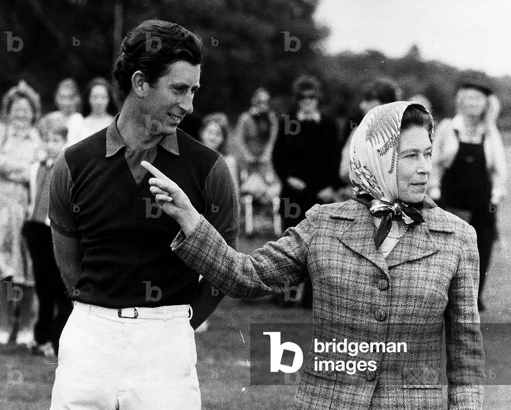 Prince Charles (Future Charles III) and his mother Queen Elizabeth II at a polo tournament, 1979 (b/w photo)