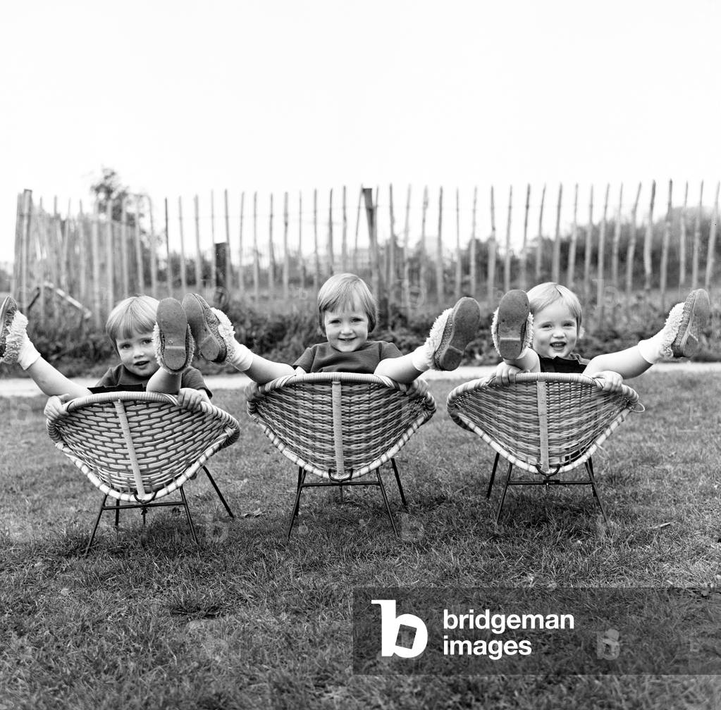 The Hatton triplets from Manchester, Deborah, Sharon and Allison. 29th October 1964 (b/w photo)