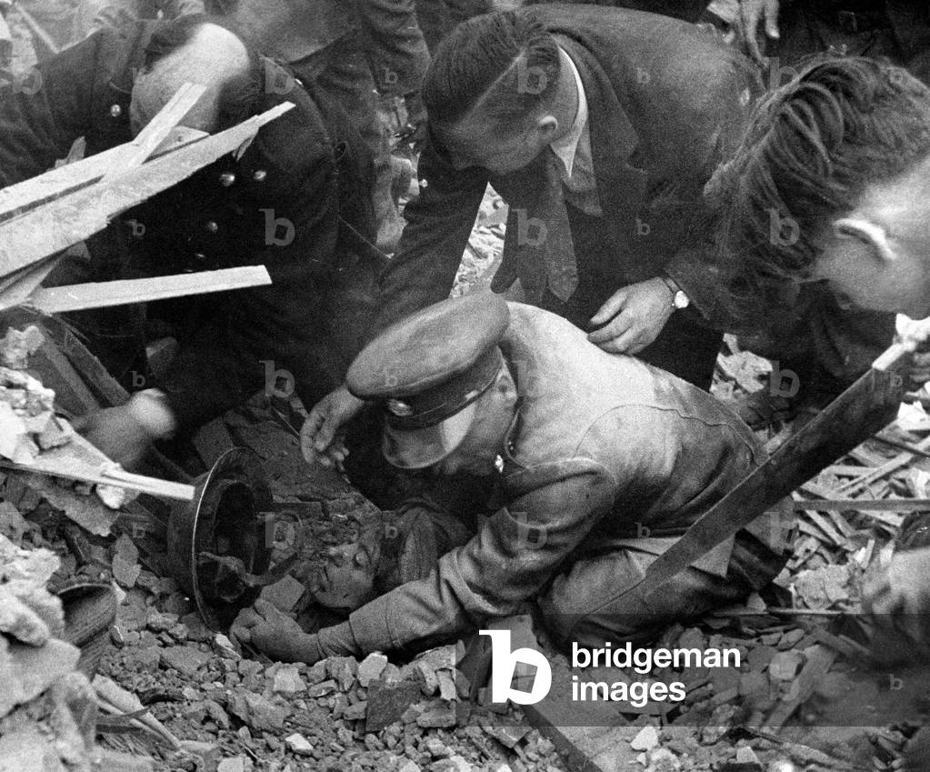 Near Manor park station, Manor park, London, E. rescue of buried woman. July 1944