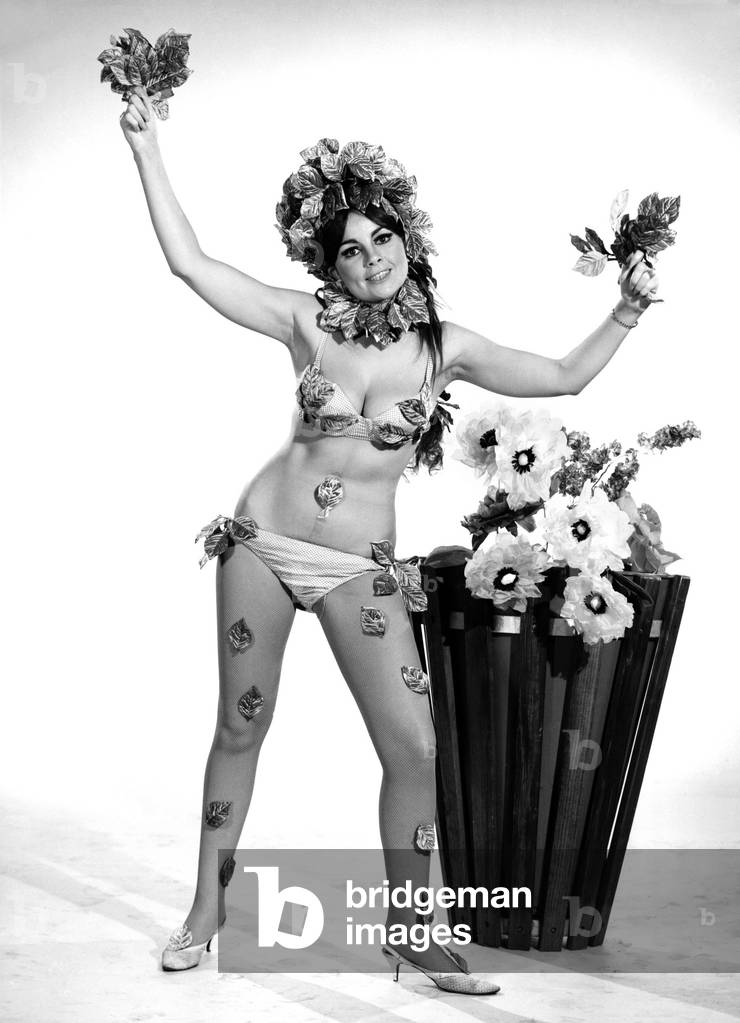 Model Karen Young wearing easter flower costume, 1966 (b/w photo)
