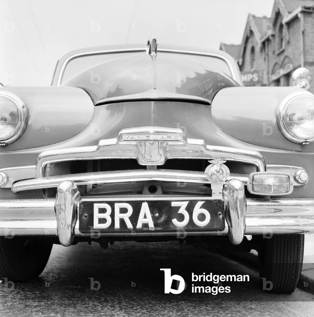 Standard Vanguard car with humourous registration number plate BRA 36, 1955 (b/w photo)