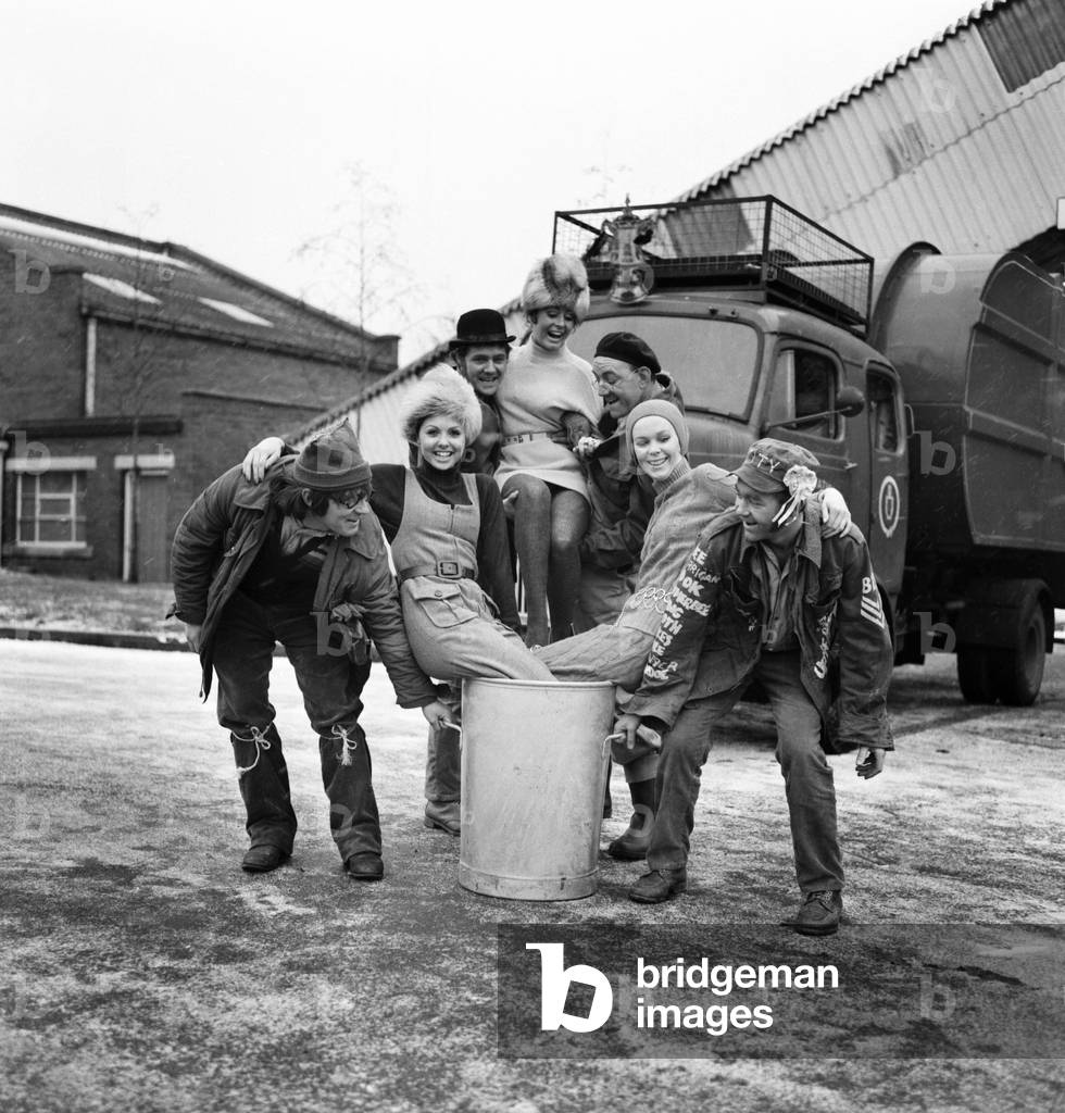 It's a dustbinman's dream... a bin-full of glamour girls! Now wonder the cast of Granada television series 