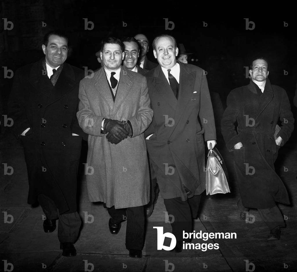 One of the accused Gomer Charles (with case) photographed after the trial with solictor Tobty Carter. 2nd February 1954.