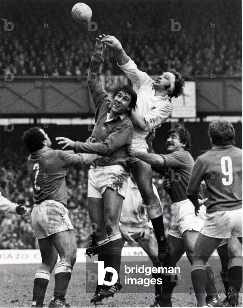 Five Nations match at Twickenham. England 7 v France 6 Bill Beaumont, the England skipper goes up for the ball in a line-out against France, 3rd March 1979 (b/w photo)