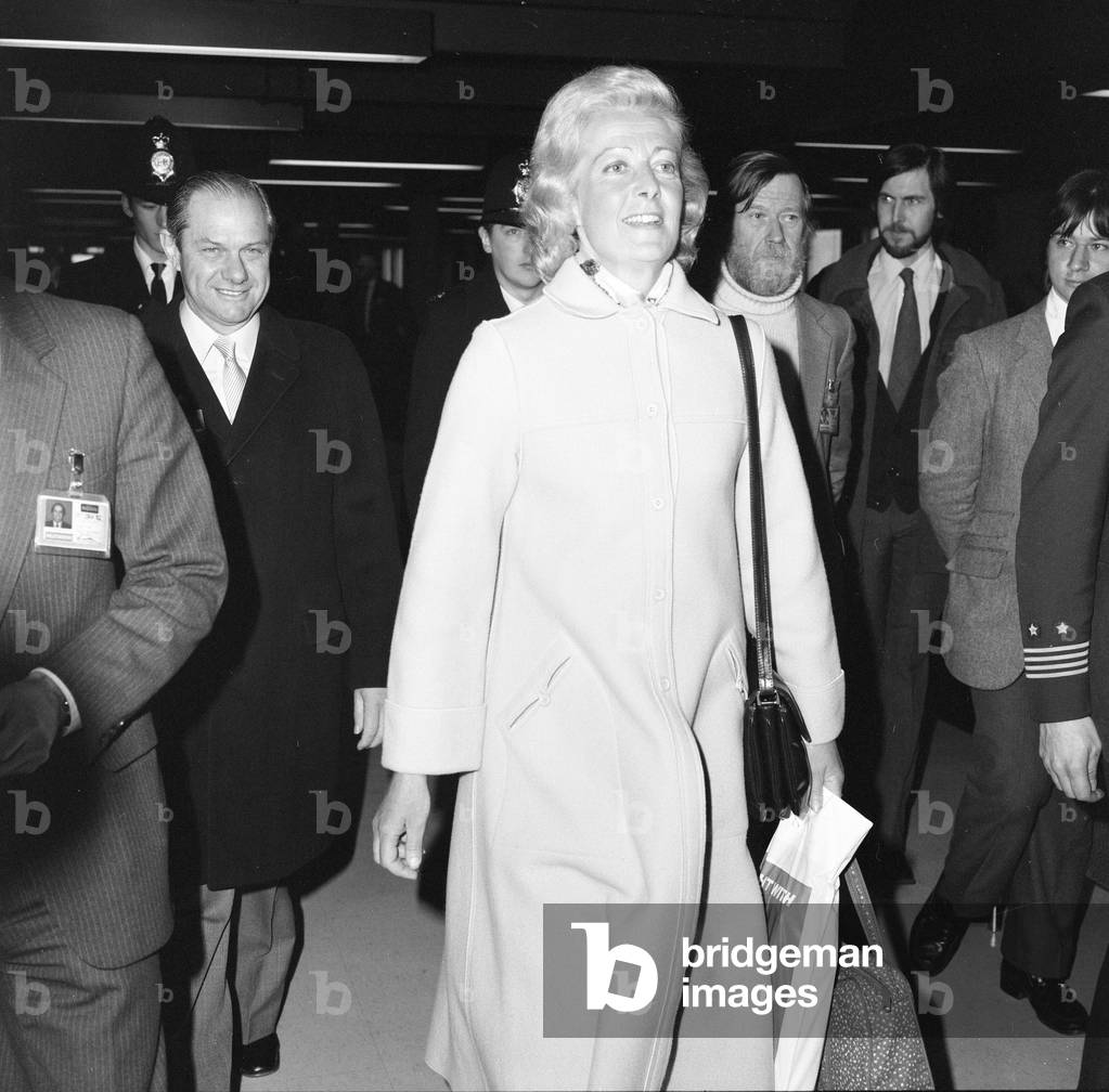 Frances Shand Kydd, mother of Lady Diana Spencer, recently engaged to Prince Charles, receives a great deal of media attention as she arrives at London Heathrow Airport, from Australia, Thursday 26th February 1981 (b/w photo)