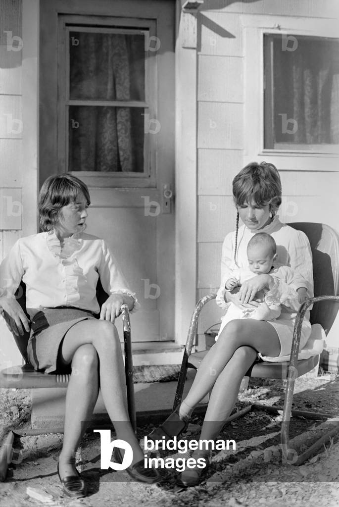 The two girls arrested with Manson and others at commune. They are the only ones out on bond. Blond: Sandra Good Pugh, 26, with her son Ivan 2 1/2 months old. Redhead is Lynne Fromme, 21. 05/12/ 1969