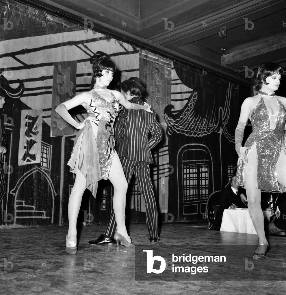 Paris Lido Feature. Cabaret dancers perform on stage at a night club in Pan's, France. December 1969
