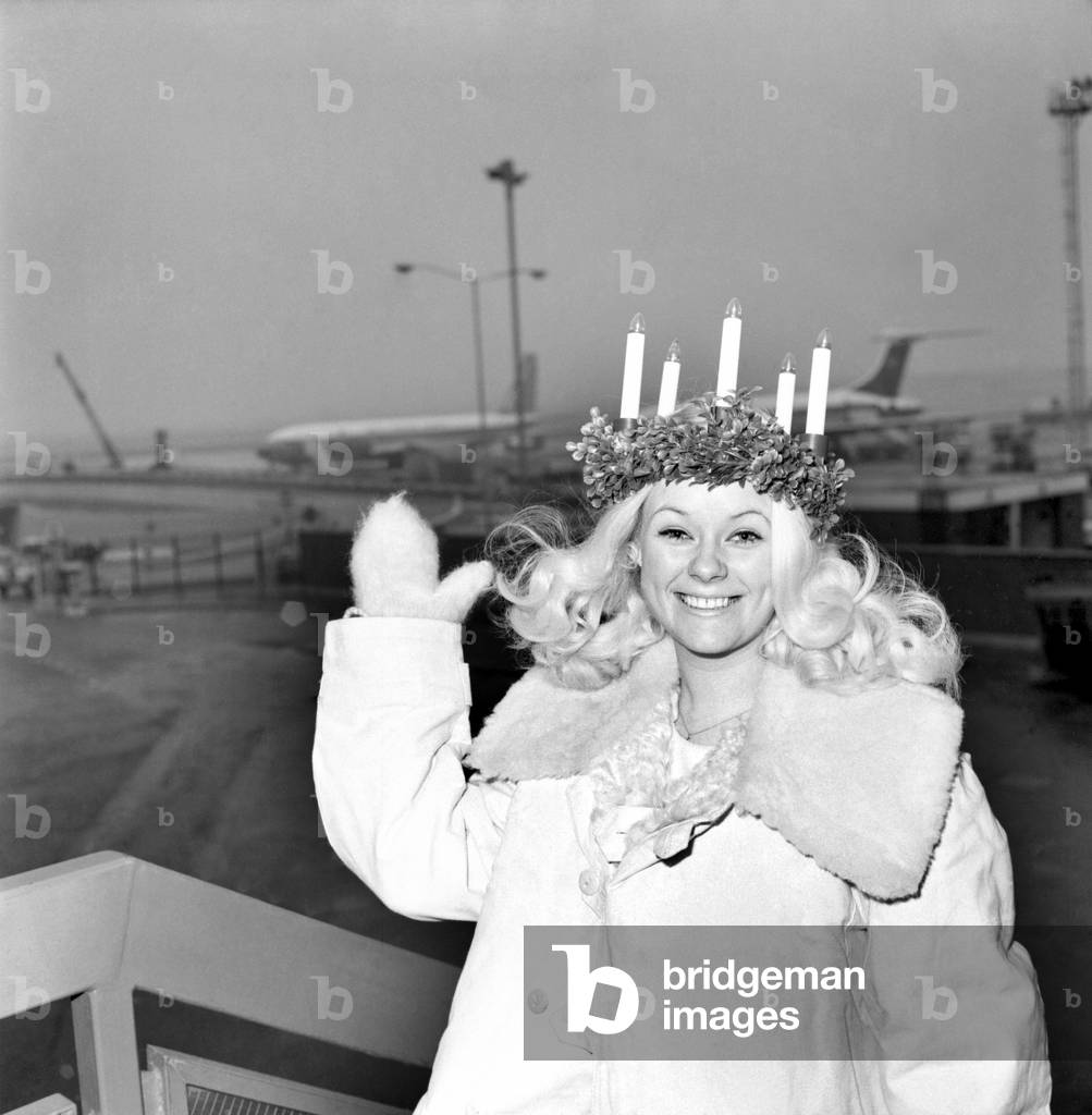 Lucia, Sweden's Queen of Light representative arrived in London, 17th December 1969 (b/w photo)