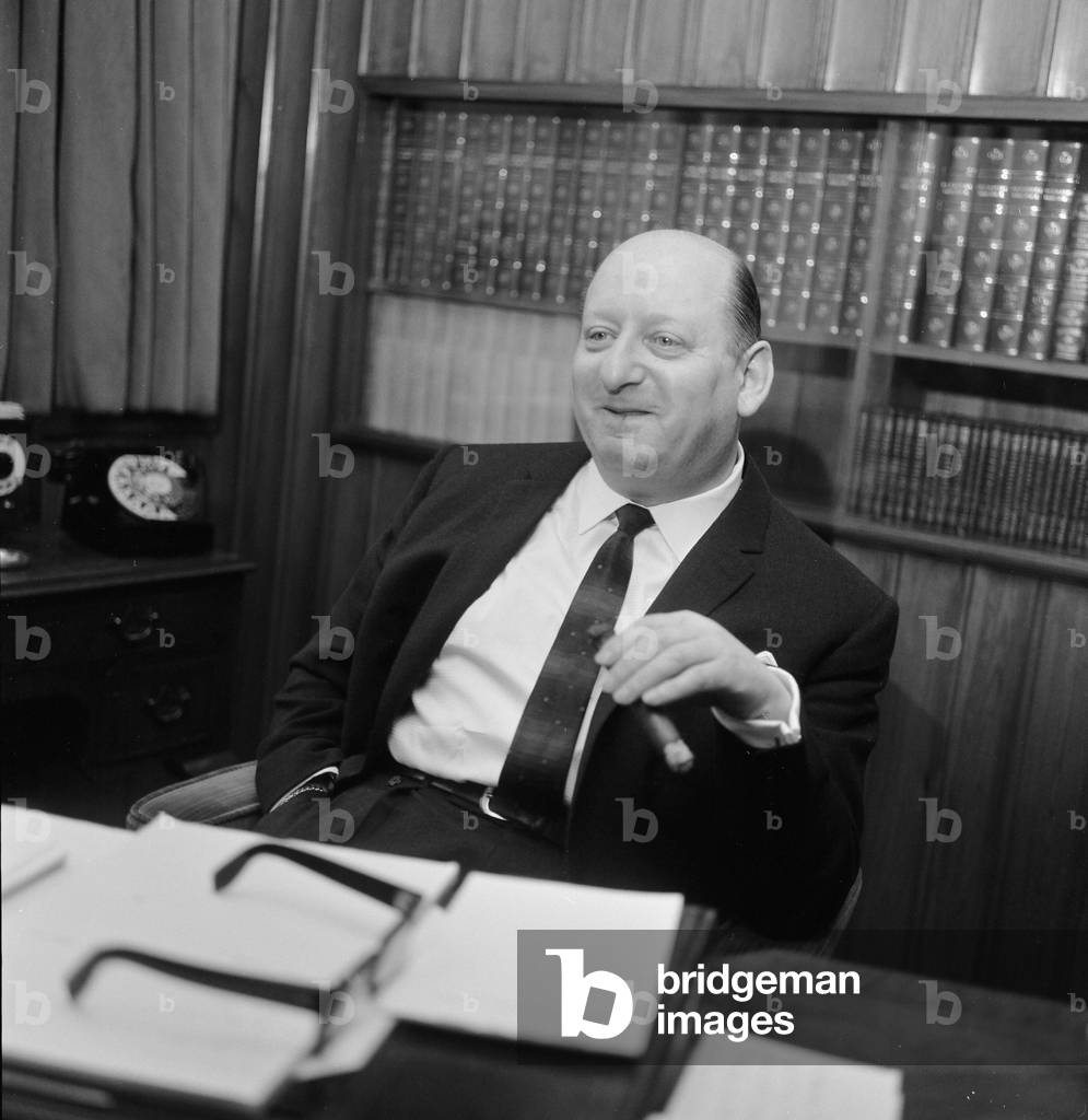 Media mogul Lew Grade pictured in his office at the ATV studios in Great Cumberland Place, London. 21st February 1964 (b/w photo)