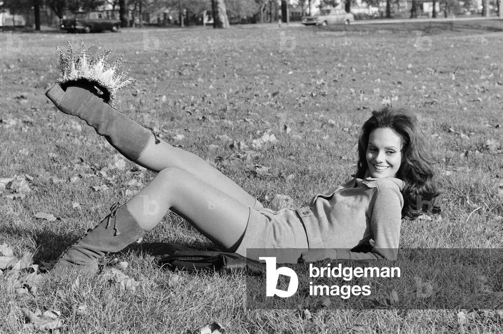 Lucia Tavares Petterle of Brazil, winner of the Miss World beauty contest at the Royal Albert Hall in London, celebrates with her crown in Hyde Park the following day, 10th November 1971 (b/w photo)