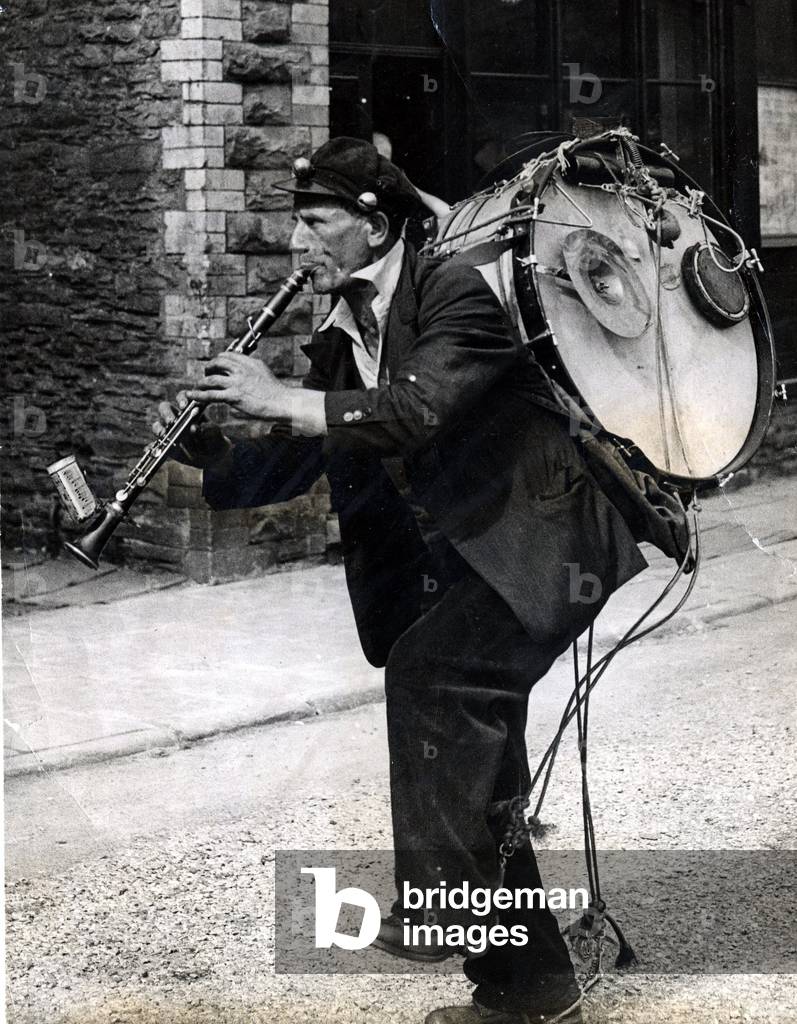 One-Man-Band - He's a rare artiste these days, and one of the few in Wales who make music - and a living - touring small towns and villages with his strange contraption. Here he's caught by a 