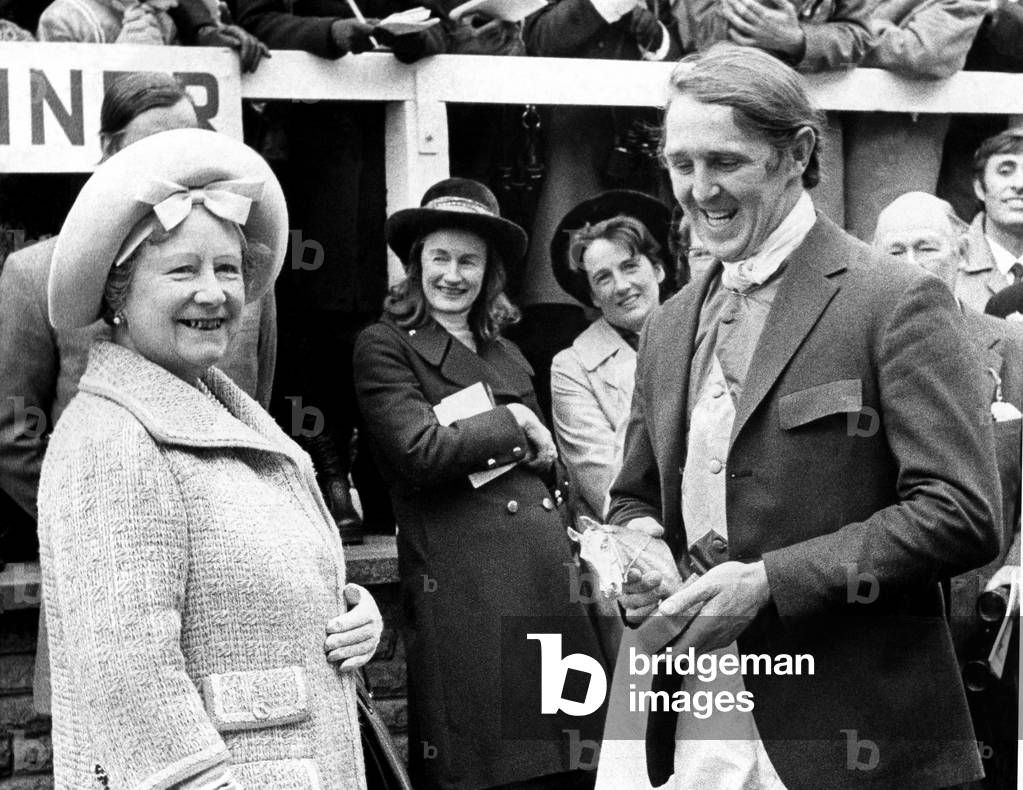 Queen Elizabeth the Queen Mother North East Visits Queen Elizabeth the Queen Mother during a visit to Gosforth Park Racecourse, Newcastle, talks to jockey Ron Barry after his victory on Charlie Potheen in the Whitbread Gold Cup Handicap Chase 28th April 1973 (b/w photo)