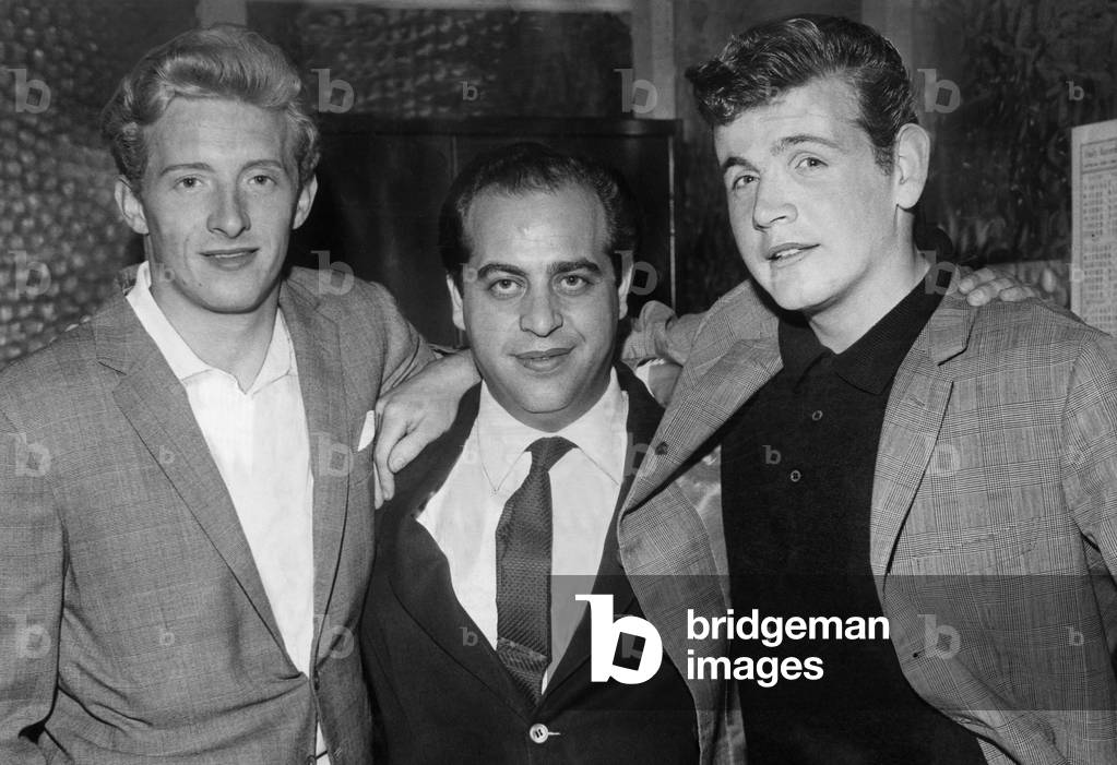Scottish footballer Denis Law with Turin sporting director Gigi Peronace centre and Joe Baker. June 1962 (photo)