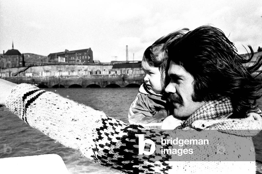 Lindisfarne sailed down the Tyne on a musical journey. The group were filming on board a Tyne ferry for a half-hour television show called 'All Right Now'. Ray Jackson. 4th March, 1979 (b/w photo)