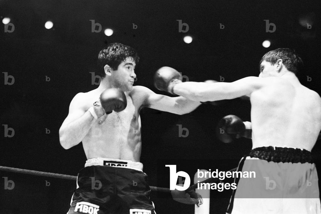 Boxing match between Jimmy Tibbs (white shorts) v Franco Macchia, held at the Royal Albert Hall, Kensington, London. Won by Jimmy Tibbs. 7th March 1967 (b/w photo)
