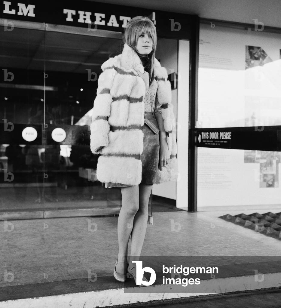 Marianne Faithfull, just before her relationship with Rolling Stones singer Mick Jagger became public, waiting for a film producer at The National Film Theatre, 4th December 1966 (b/w photo)