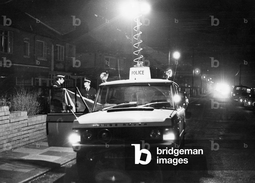 Police use search lights and a mobile radio vehicle in their search at Seaton Sluice, c.1970