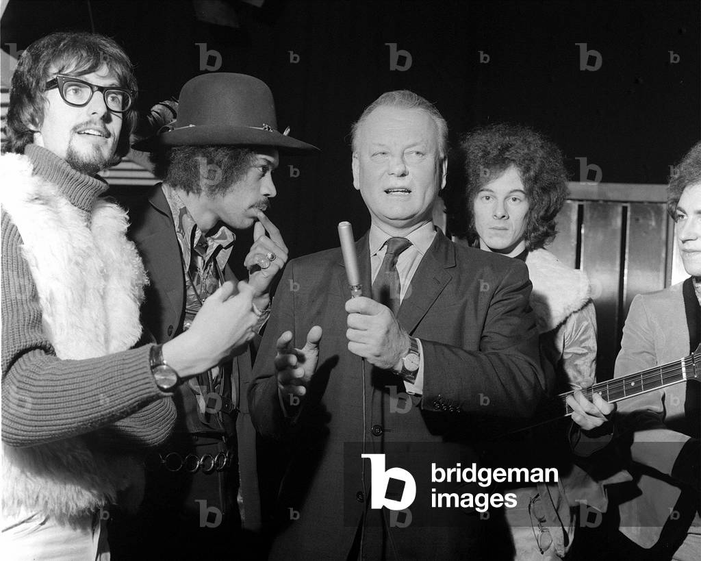 Godfrey Winn makes singing debut on television, with Jimi Hendrix, Jonathan King, Noel Redding and Mitch Mitchell, 1967 (b/w photo)