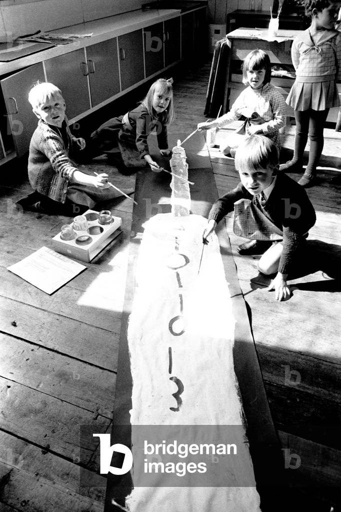 Youngsters enjoy a painting class at Seaton Delaval First School, Tyne and Wear, 14th April 1970 (b/w photo)