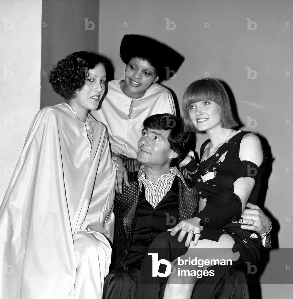 Hair Fashion Talk. L/R Bernadette (one eyed wave), Joan Daye (flat top Afro style), Liz Batchelor (bob with fringe), with Vidal Sassoon, February 1975 (b/w photo)
