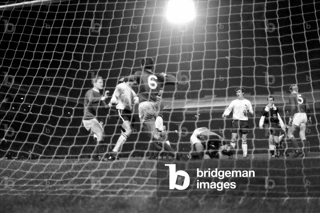 League Cup Quarter Final Manchester United v Derby CountyUnited goalkeeper Alex Stepney is bundled to the ground as Derby make a late desperate bid for an equaliser but referee blows up for a foul. December 1969 (photo)