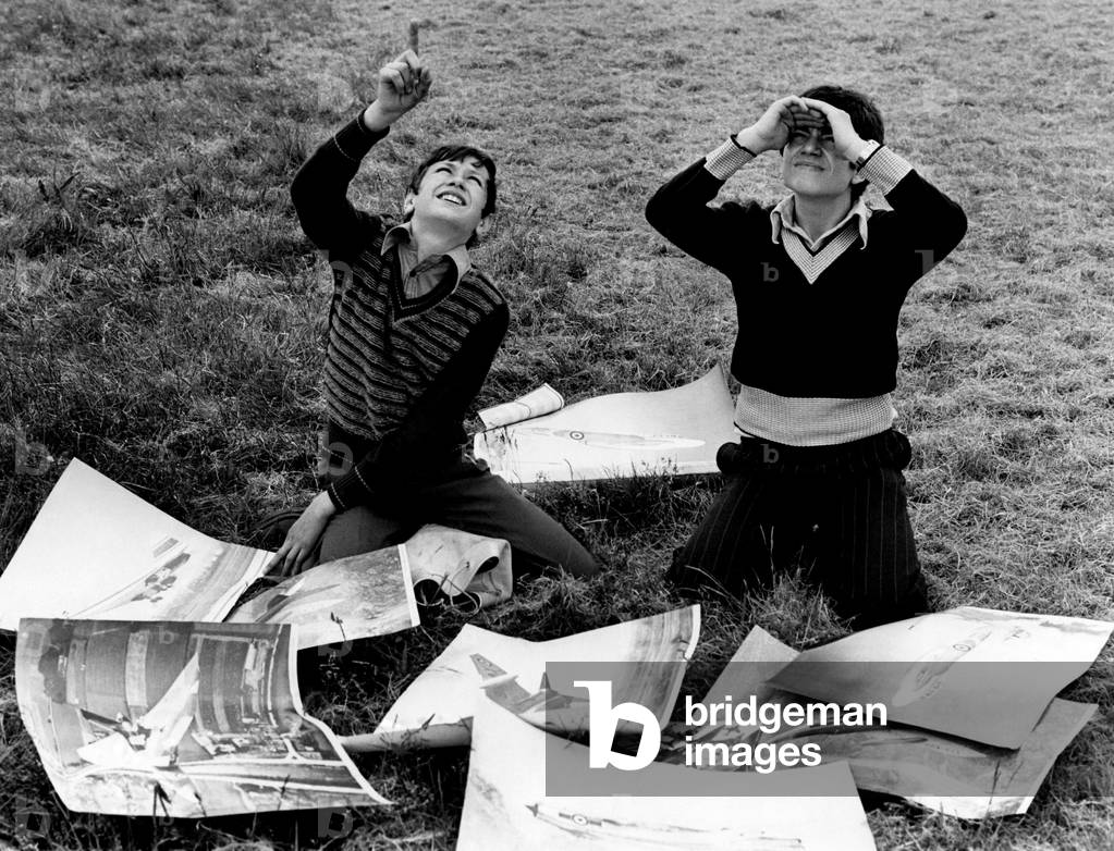 ATC cadets Craig Whitaker (14) left, and Alan Foy (14) of the 18th 32 Squadron based in North Manchester plane spotting at an air show, 5th June 1976