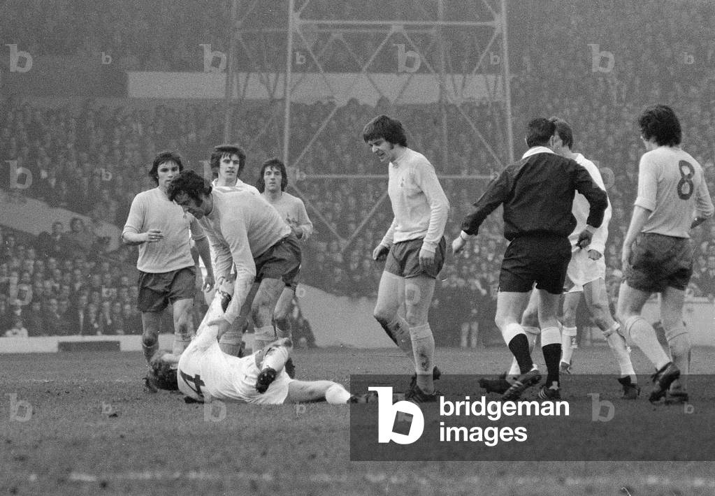 FA Cup Quarter Final match at Elland Road. Leeds United 2 v Tottenham Hotspur 1 Mike England of Spurs fighting with Billy Bremner, 18th March 1972 (b/w photo)