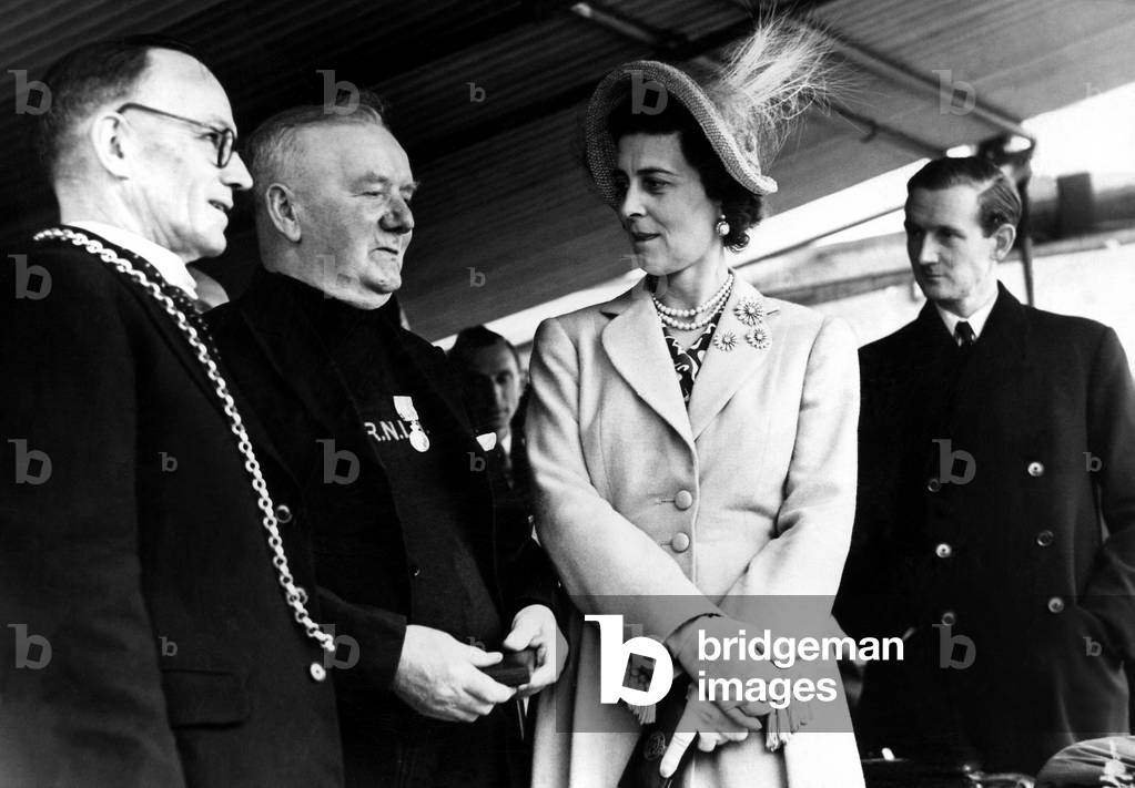 Prince George and Princess Marina - The Duke and Duchess of Kent North East Royal Visits The Princess launches the Lifeboat, Tynesider, chatting to Coxswain George Lisle, whom she awarded a medal for his 21 years of service at Tynemouth RNLI, the Mayor of Tynemouth, Count W R Forster and the Duke of Northumberland are also pictured 11 May 1948 (b/w photo)