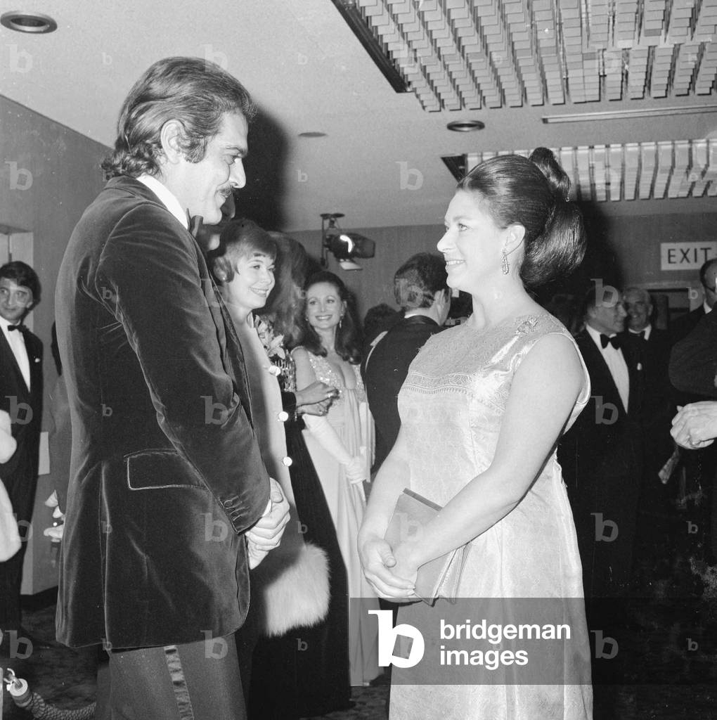 Omar Sharif with Princess Margaret at the premier of MacKennas Gold. April 1969 (b/w photo)