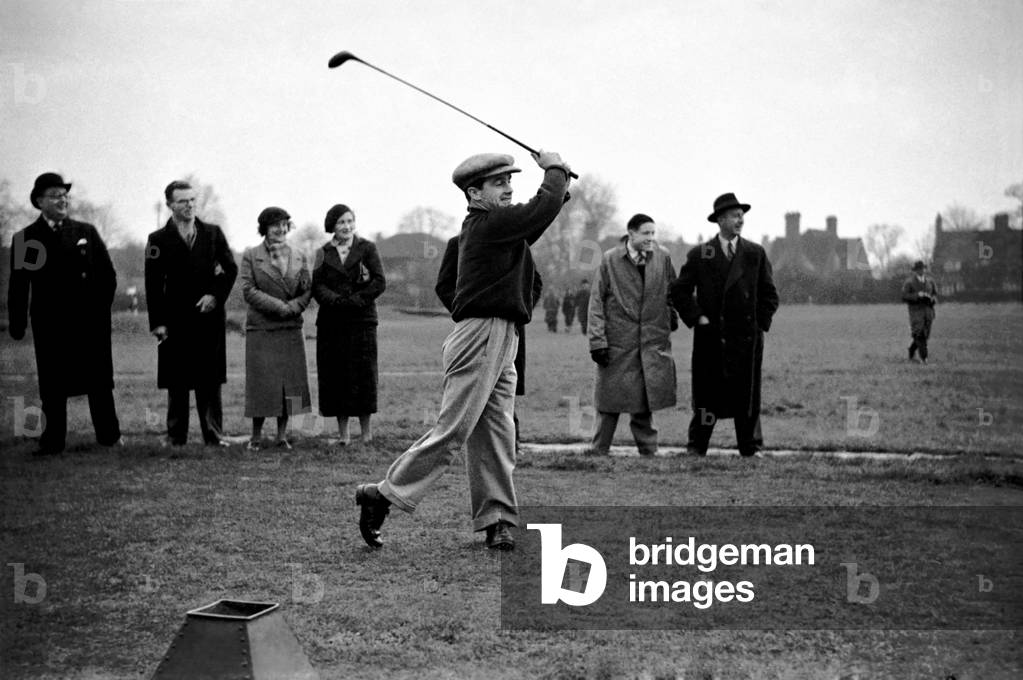 Jockey Gordon Richards seen here playing golf at Romford. October 1937 (b/w photo)