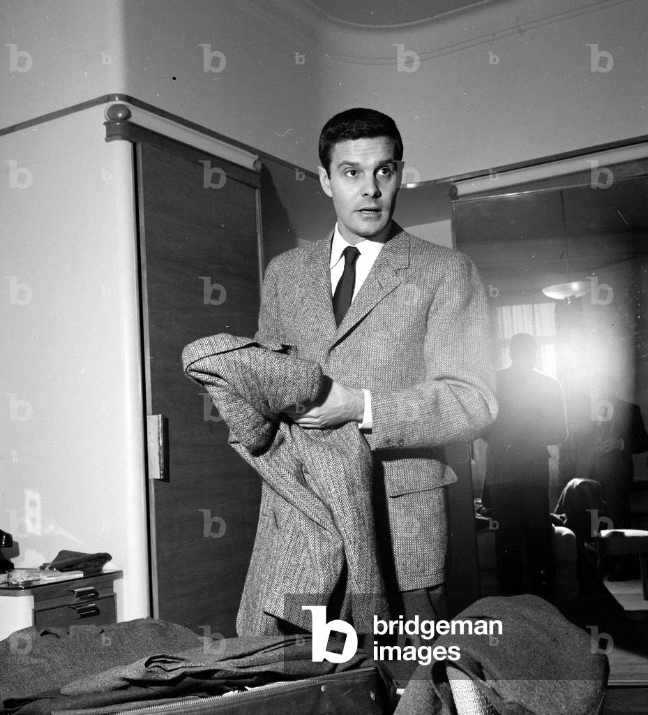 French actor Louis Jourdan pictured at Claridge's Hotel in London - he is in the country to make his first British Film at Pinewood Studios March 1957 (b/w photo)