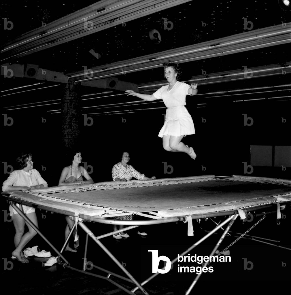 Bultins Holiday Pwllheli: Mrs. Nellie McGrail, Pools Winner. Horse riding/Boating/Elephant/Roller skating/Family. Now a ride the big wheel for Mrs. McGrail and Barbara. Trampolining. June 1960