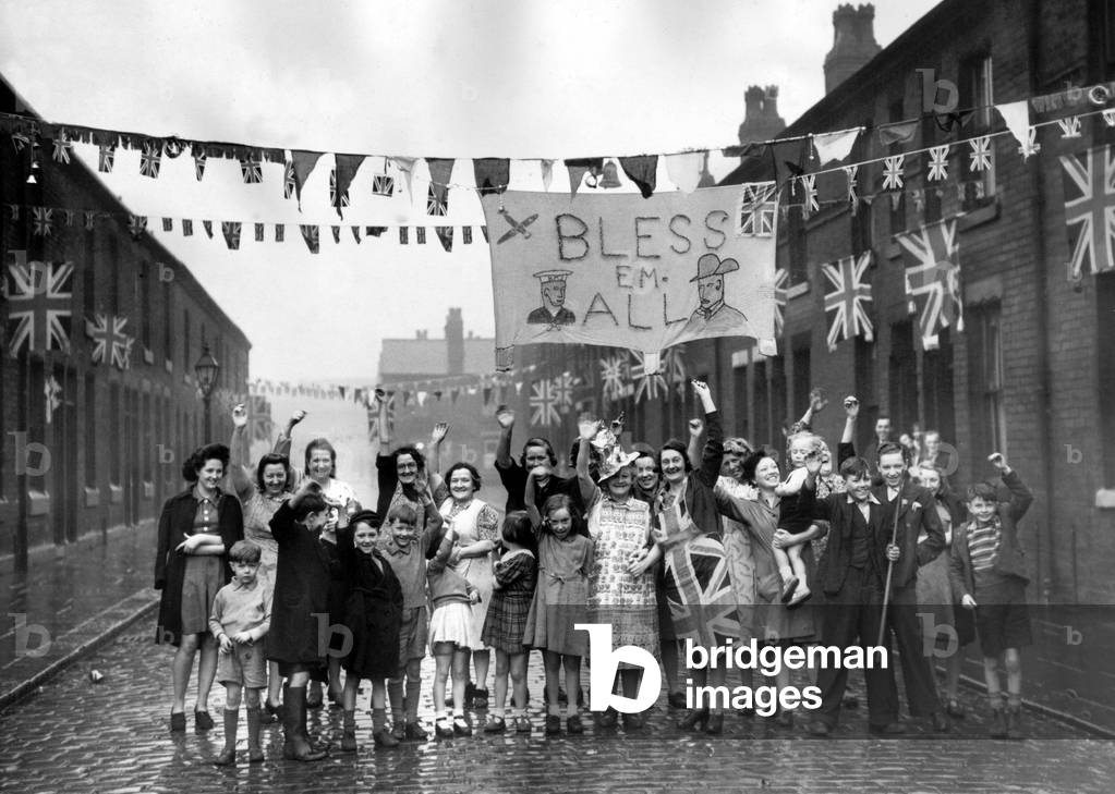 A street party in the Newton Heath district of Manchester during VE Day celebrations, 8th May 1945