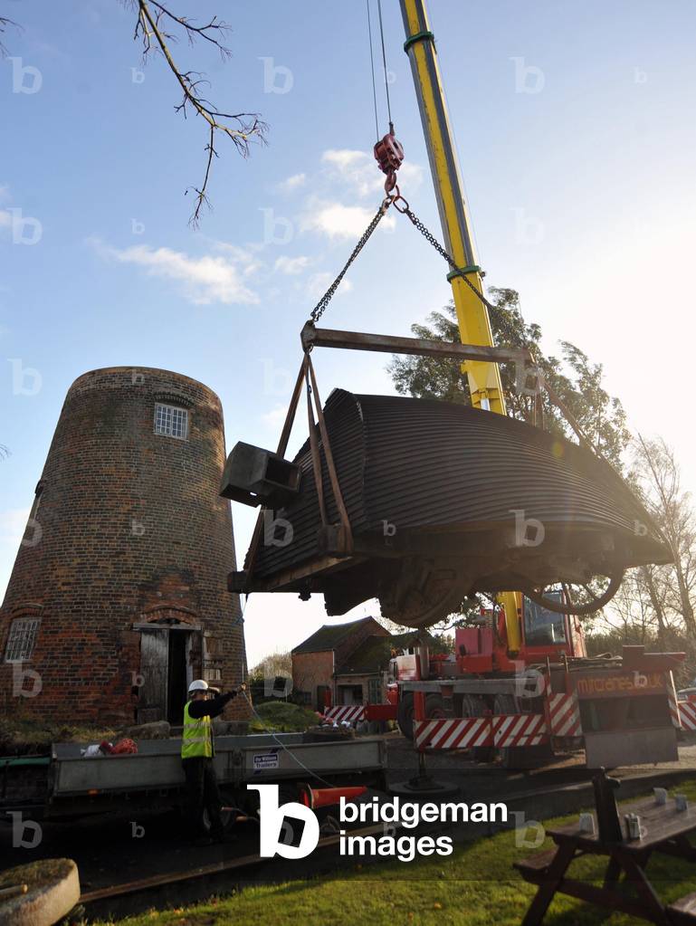 A major milestone has been reached in the restoration of an historic windmill near Coventry. The original 11-ton roof has been craned back into position at Berkswell Windmill. The sails are due to be fitted early next year. It is all part of a five-year English Heritage-funded project to bring the 185-year-old mill back to its former Georgian glory. It is being overseen by The Friends of the Berkswell Windmill, which formed a charitable trust to part-fund the project. It is hoped the mill will be grinding corn and open to the public by the summer. Jeanette McGarry, who has owned the Grade II-listed building near Balsall Common with her husband since 2004, said: 