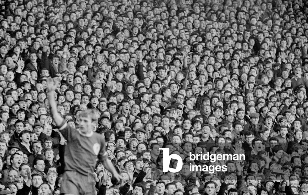 Liverpool supporter during the match against Stoke at Anfield. Liverpool went on to win the match two one 4th March 1967 (photo)