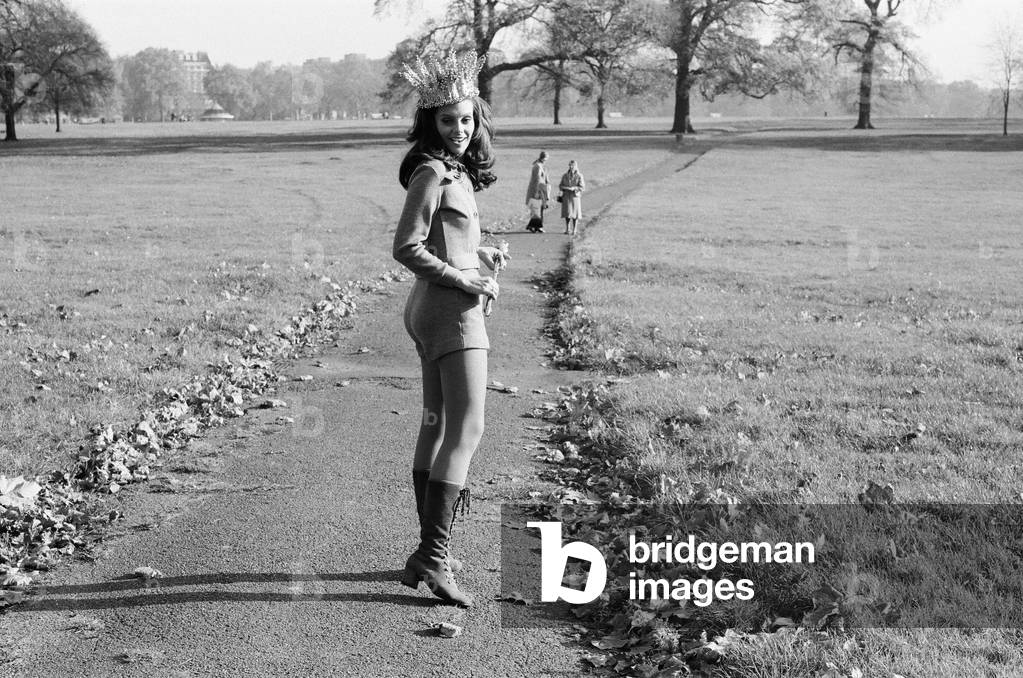 Lucia Tavares Petterle of Brazil, winner of the Miss World beauty contest at the Royal Albert Hall in London, celebrates with her crown in Hyde Park the following day, 10th November 1971 (b/w photo)